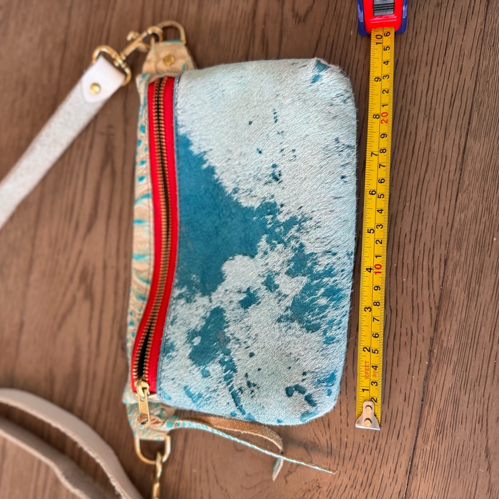 Vibrant Blue and Red Clutch with Gold Accents